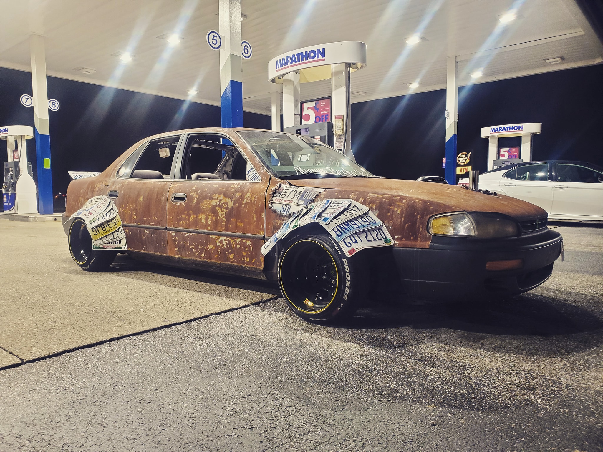 Rusted Rat Rod Toyota Camry with License Plate Fenders