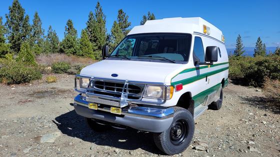 2002 Ford E-350 Super Duty Power Stroke 4x4 Overland by Whitefeather Conversions