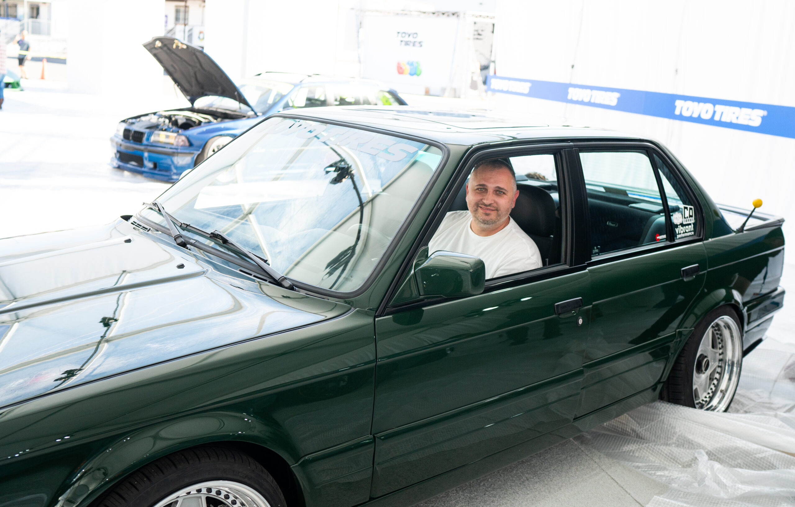 The Greenmaxhine BMW E30 Sedan by CAtuned