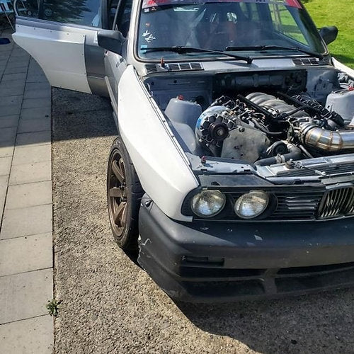 Big Duck Club BMW E30 Sedan with M3 Overfenders