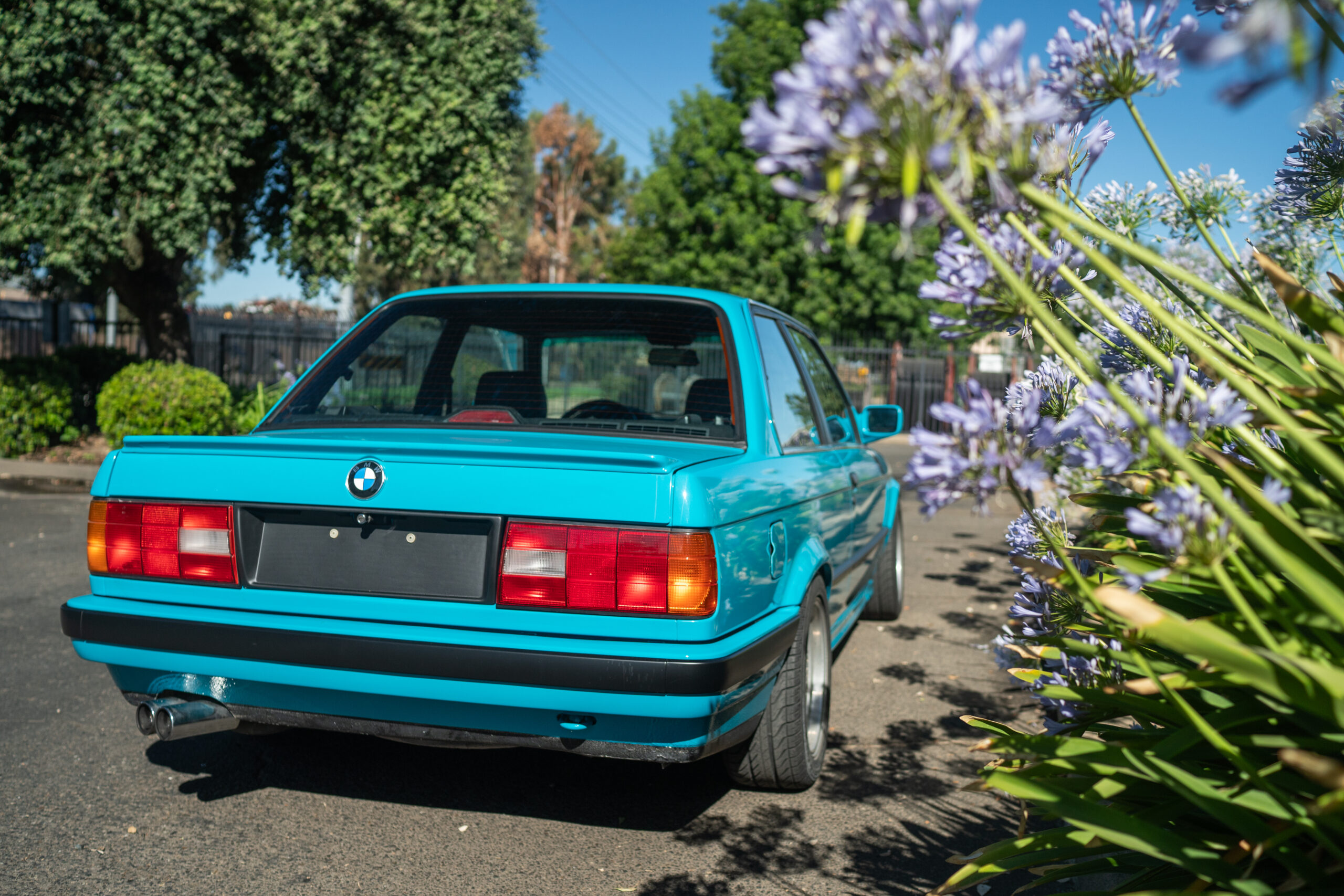 Miami Blue BMW E30 325is by CAtuned